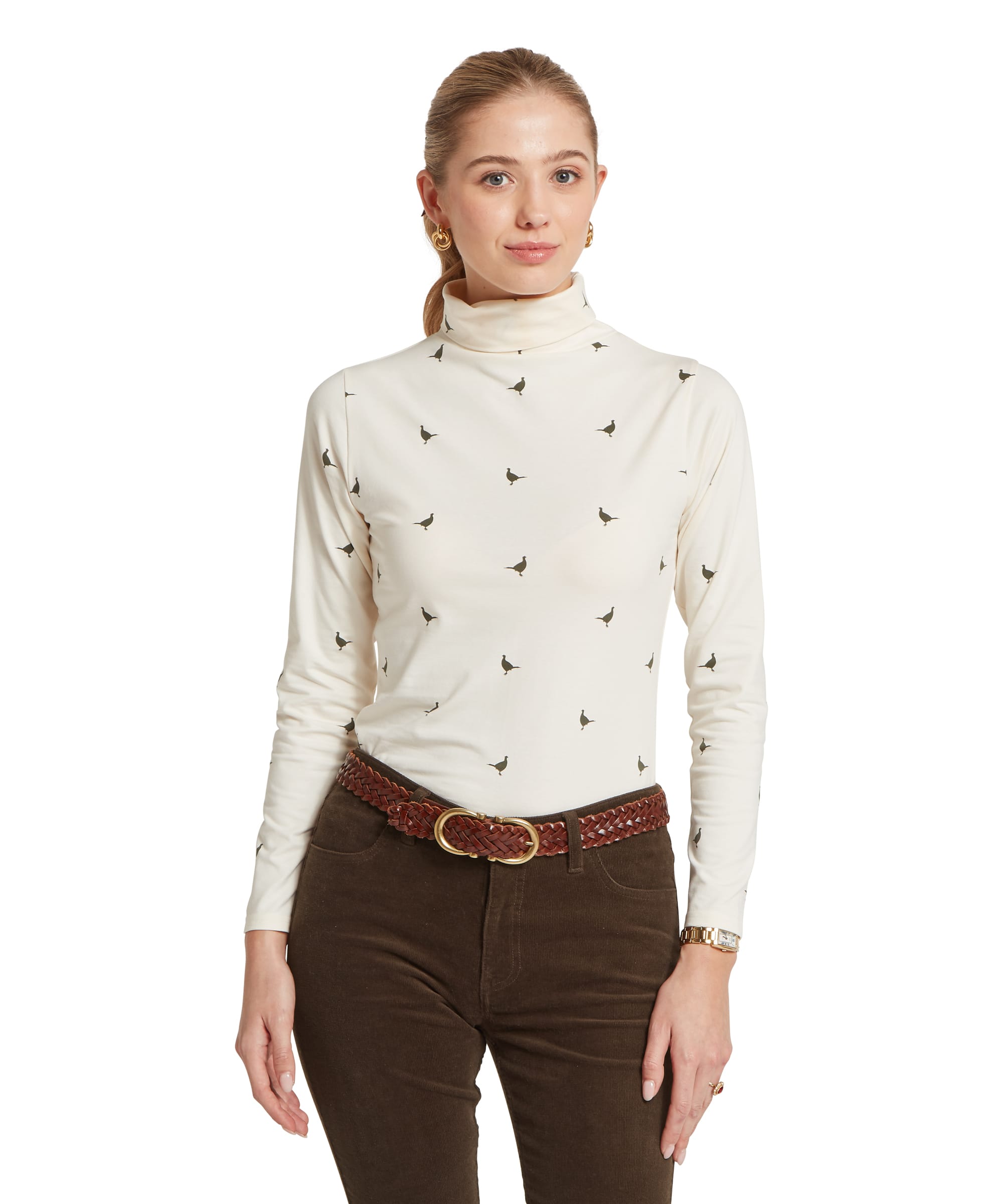 Schöffel Women's Malham Top in Ecru Pheasant Print — front view of fitted roll neck long-sleeve top with all-over pheasant motif, styled with corduroy trousers and braided leather belt