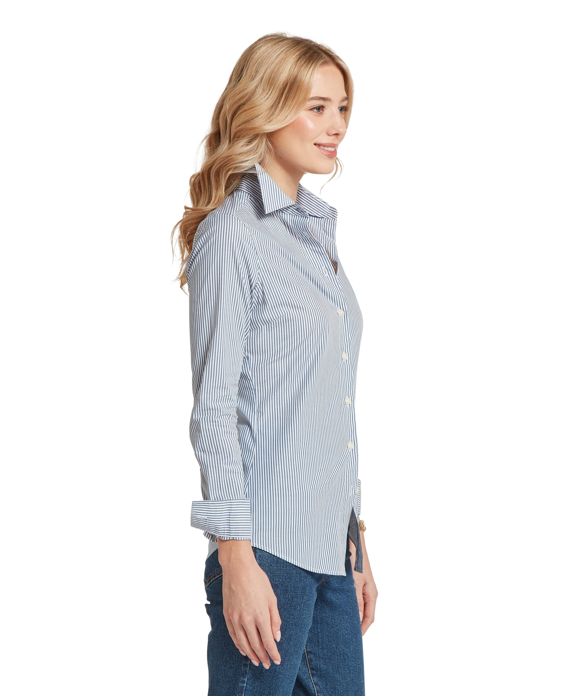 Side view of the Women's Schöffel Norfolk Shirt in navy and white stripe, showing the classic collar, fitted silhouette and double cuffs with mother-of-pearl buttons, worn with blue denim jeans.