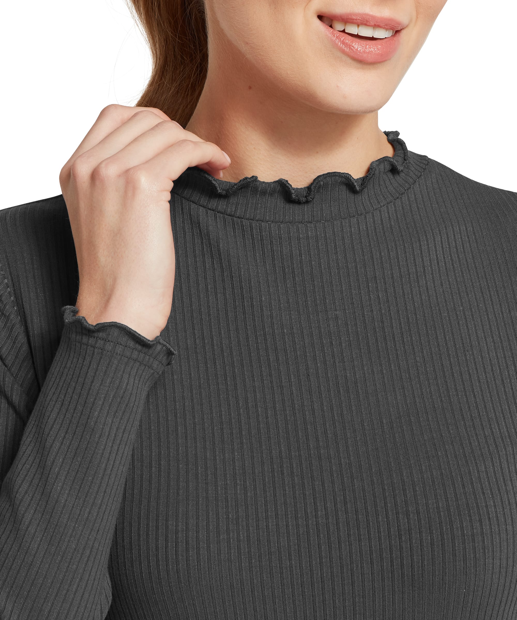 Close-up detail of the Women's Schöffel Roseberry Top in charcoal grey, showing the delicate frilled mock neck and matching frilled cuff edge on the ribbed jersey fabric.