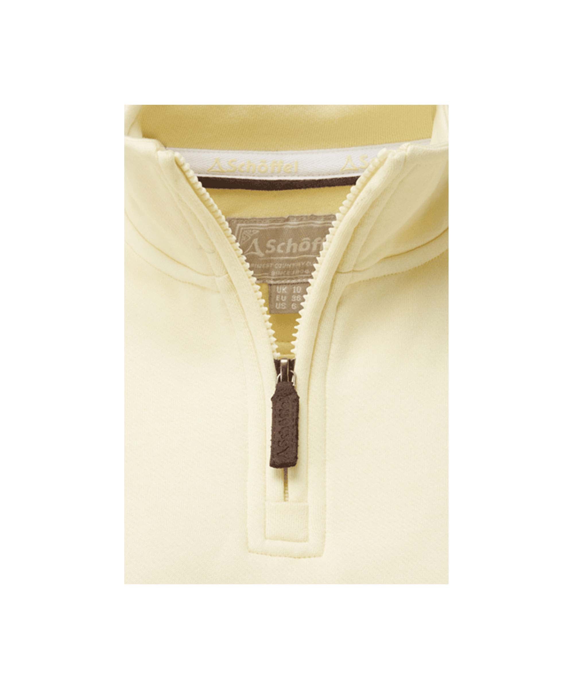 Schöffel Women's Sennen Cove Sweatshirt in Yellow close-up showing quarter zip and leather-trim pull detail