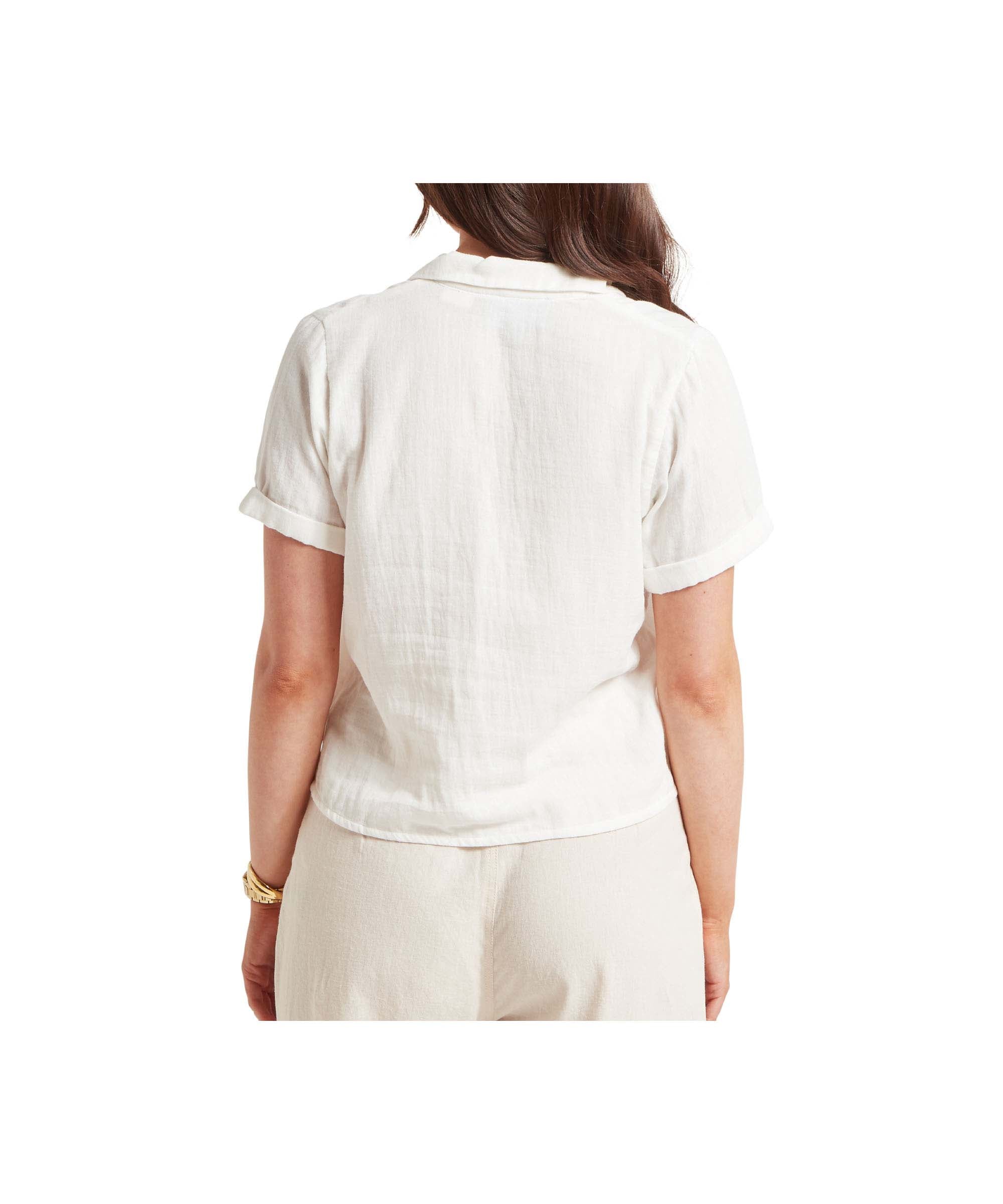 Person wearing a white short-sleeve shirt on a white background