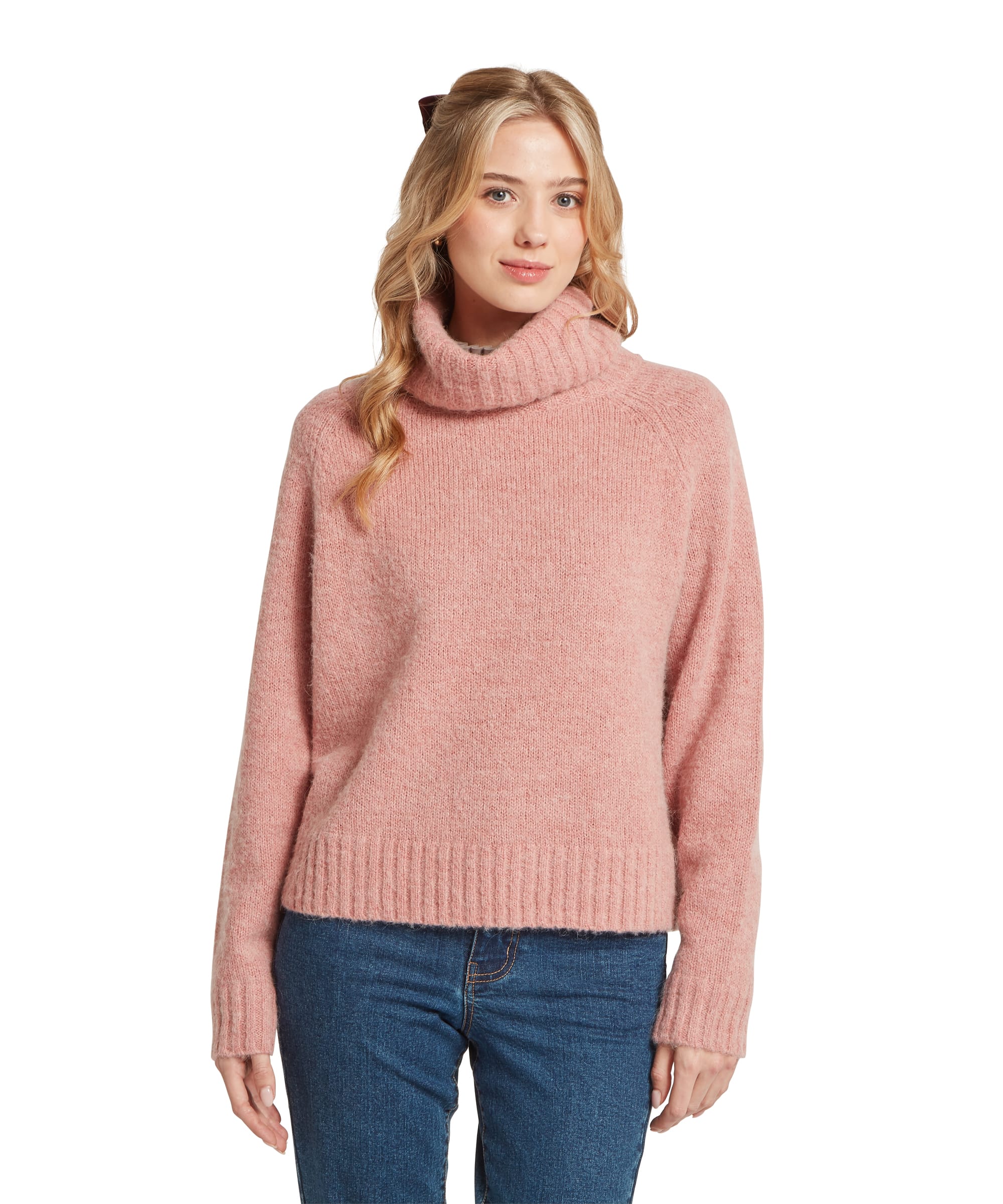 Schöffel Women's Sutton Roll Neck Jumper in dusky pink, full-length front view of a relaxed-fit knit with deep roll neck, wide ribbed cuffs, and soft brushed yarn texture, worn with blue denim jeans