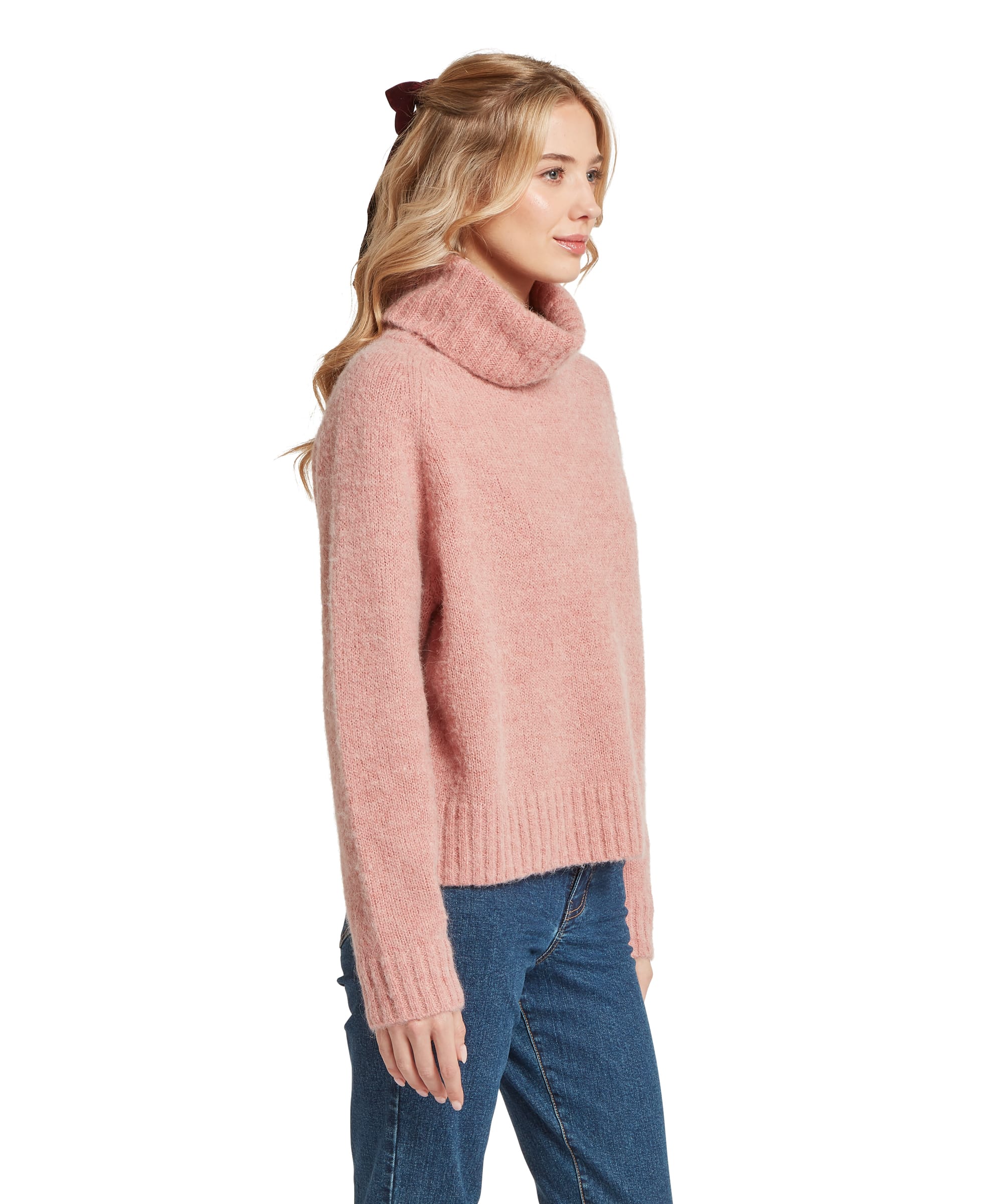 Schöffel Women's Sutton Roll Neck Jumper in Blush Pink — side profile showing oversized roll neck, relaxed fit and soft brushed knit texture, styled with straight-leg jeans