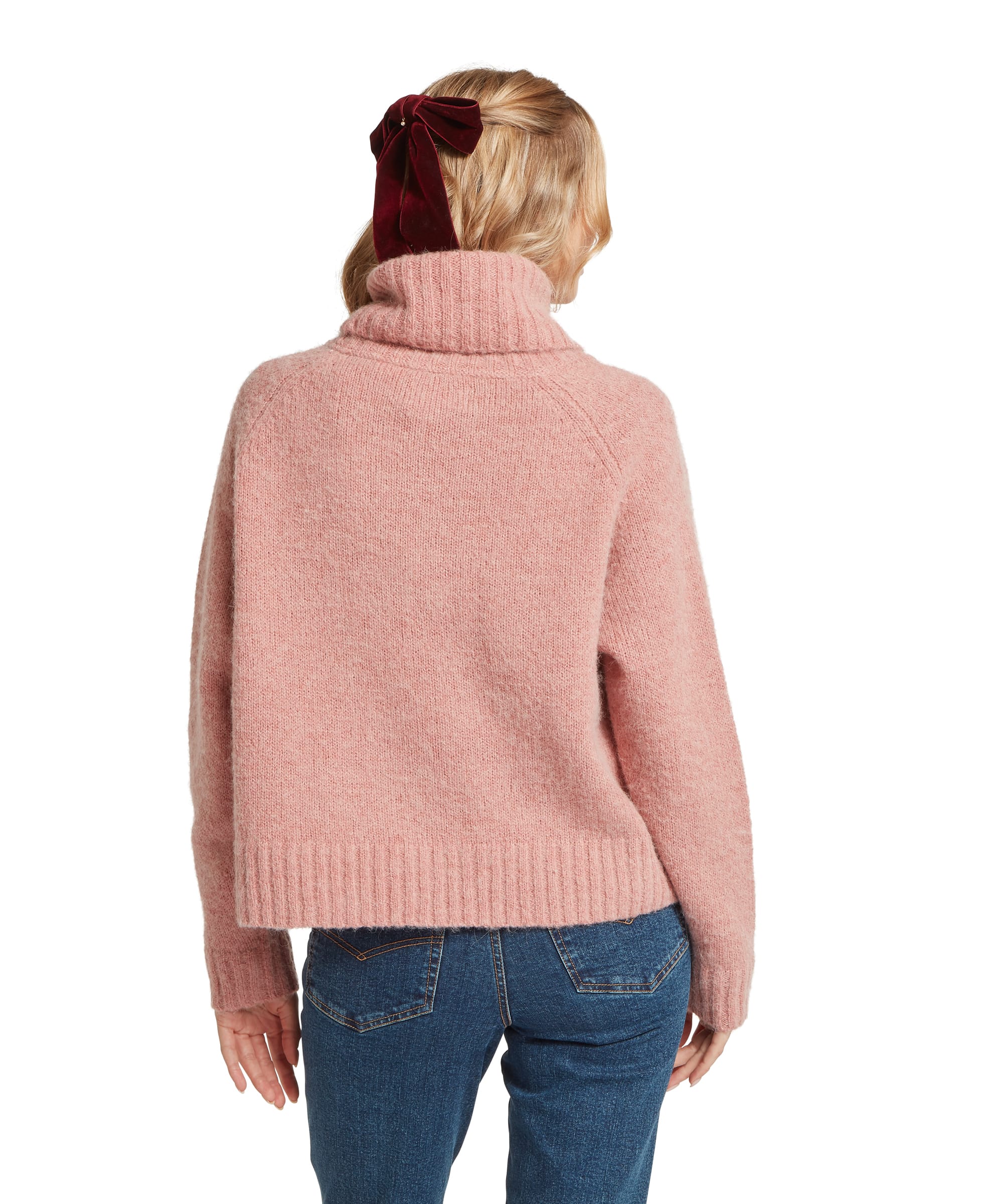 Schöffel Women's Sutton Roll Neck Jumper in Blush Pink — rear view showing relaxed cropped silhouette and soft ribbed knit texture, styled with straight-leg jeans