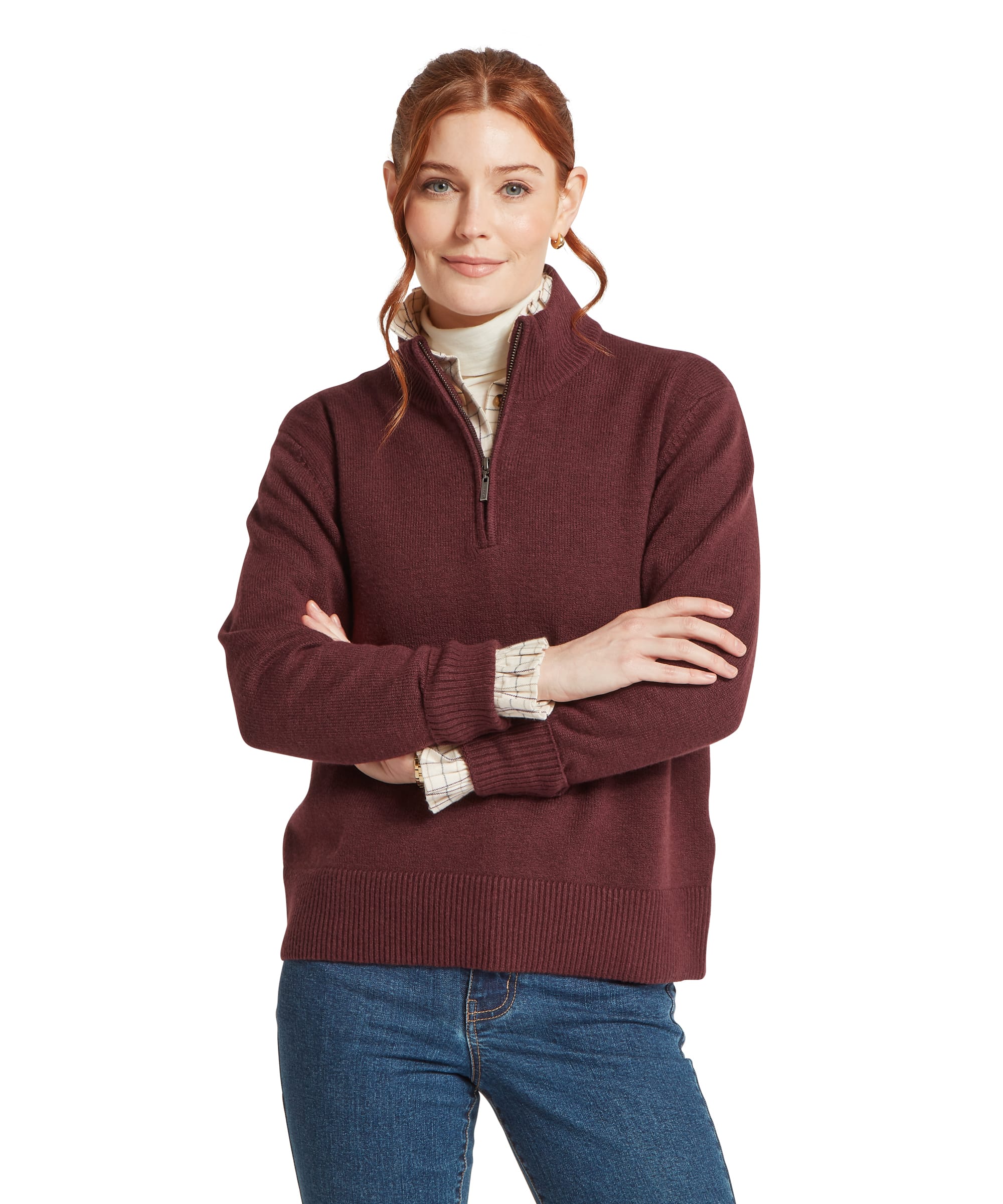 Women's Schöffel Thoralby Quarter-Zip Jumper in rich burgundy, featuring an oversized lambswool knit with quarter-zip stand collar and deep ribbed hem, worn over a cream tattersall check shirt with blue denim jeans.