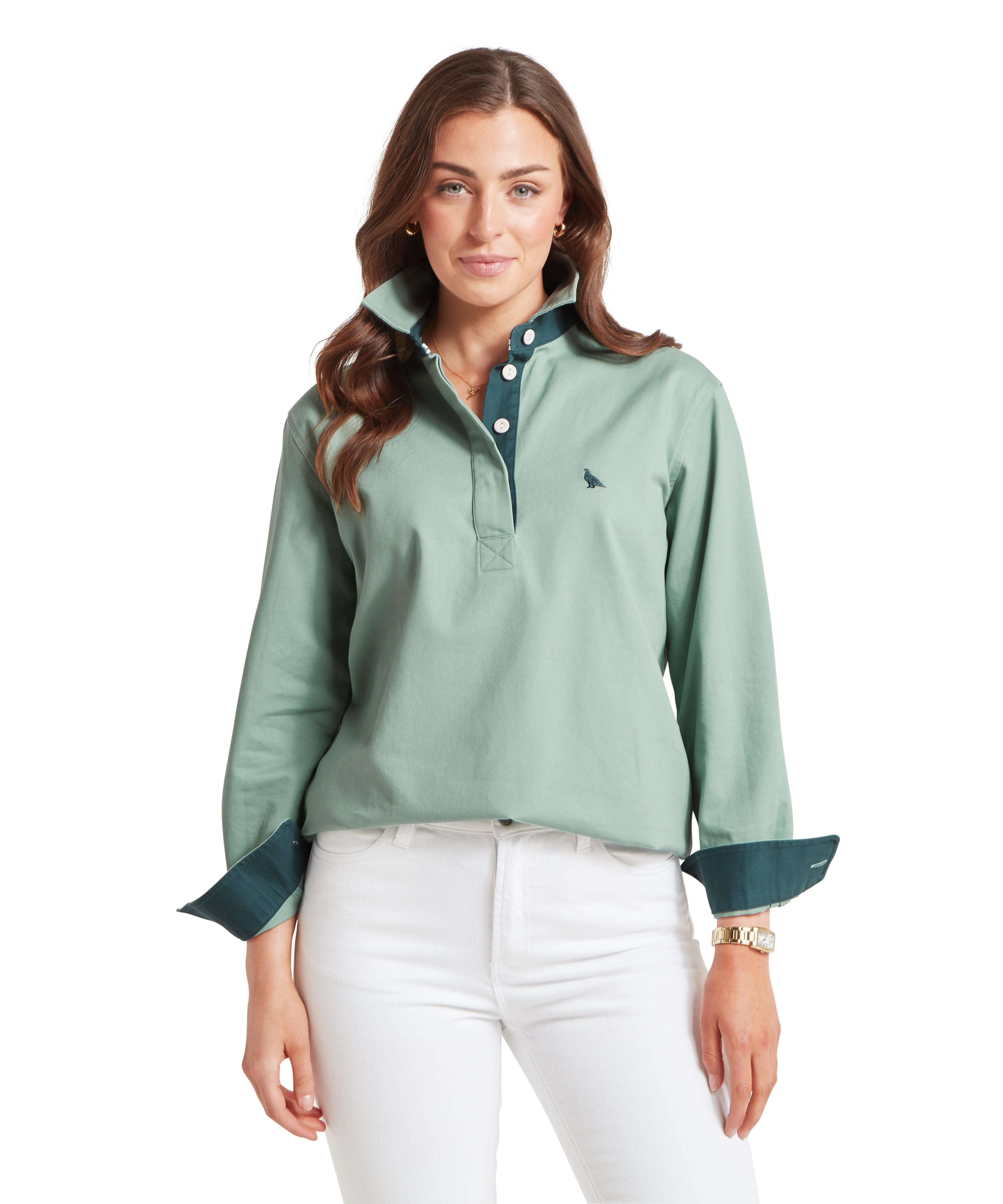 Woman wearing a green long-sleeve shirt with a collar on a white background